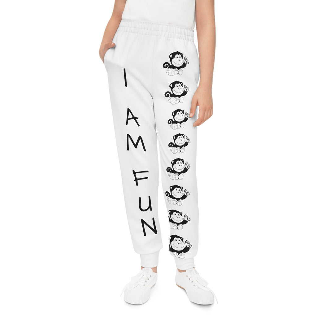 Front-view of a girl wearing white sweatpants with a line of black and white monkeys down the front left leg and the phrase "I am fun" down the front right leg.