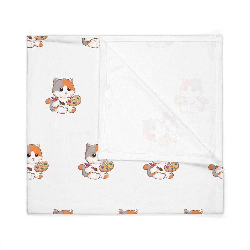 A white swaddle blanket with a repeating pattern of a cat. The blanket is folded into a square.