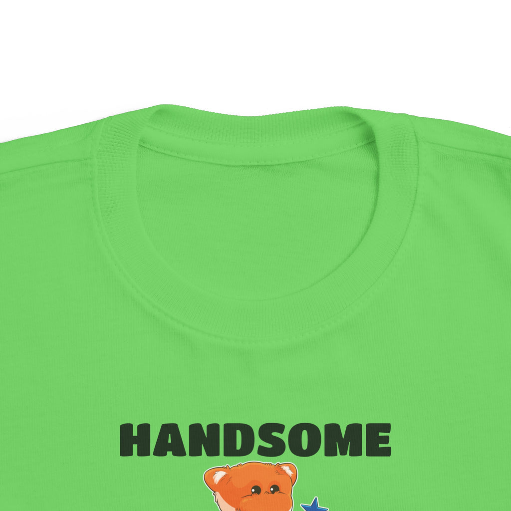 A close-up of the crew neckline of a short-sleeve green shirt with a picture of a fox that says Handsome Like Dad.