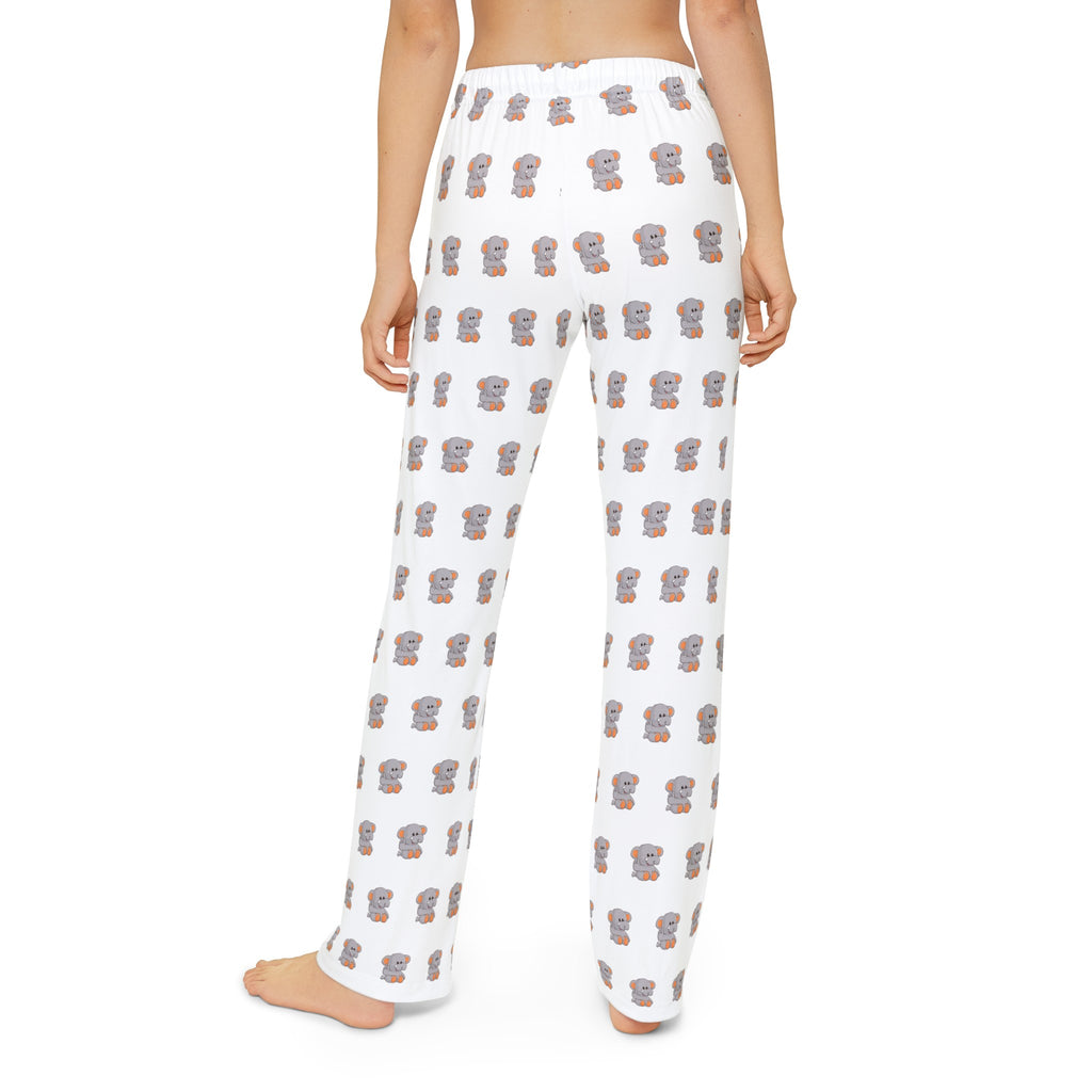 Back-view of a kid wearing white pajama pants with a repeated pattern of an elephant.