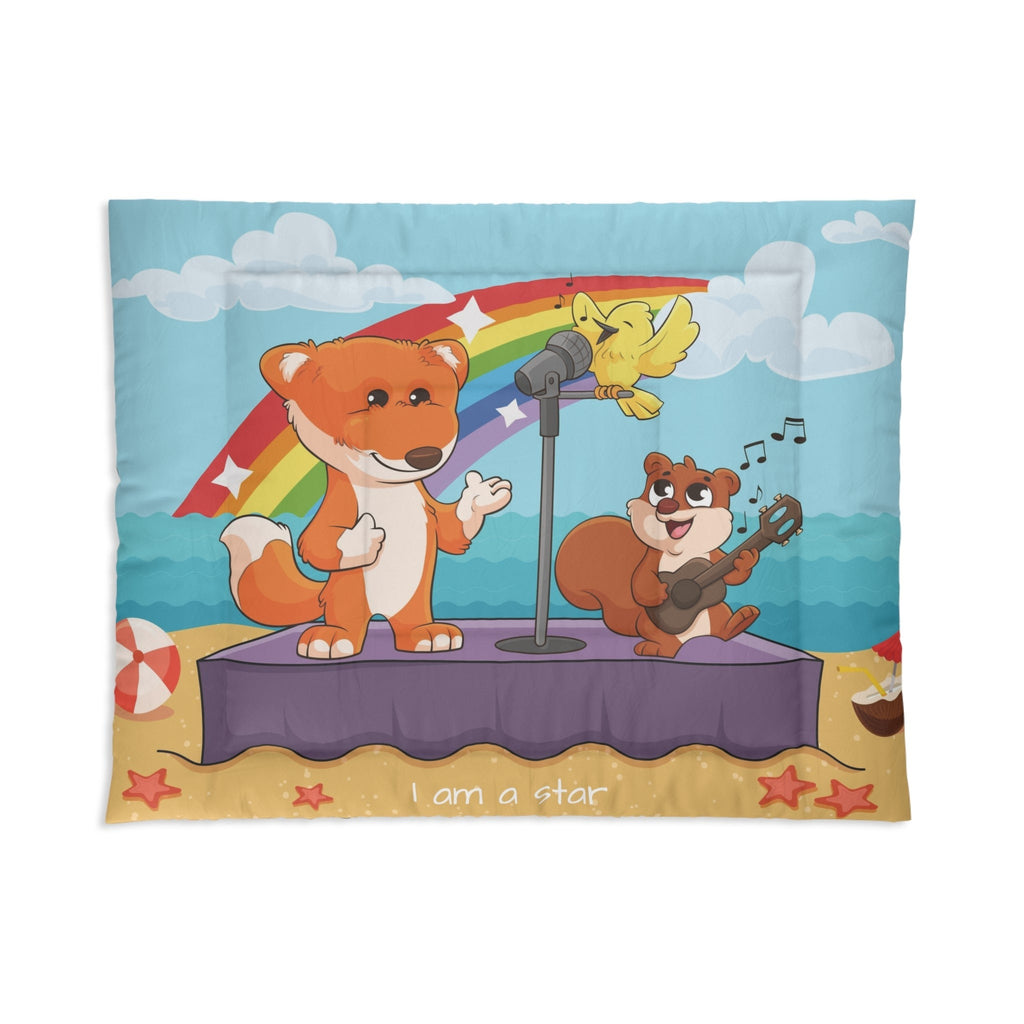 A 68 by 88 inch bed comforter with a scene of a fox singing with a bird and squirrel on a stage on the beach, a rainbow in the background, and the phrase "I am strong" along the bottom.