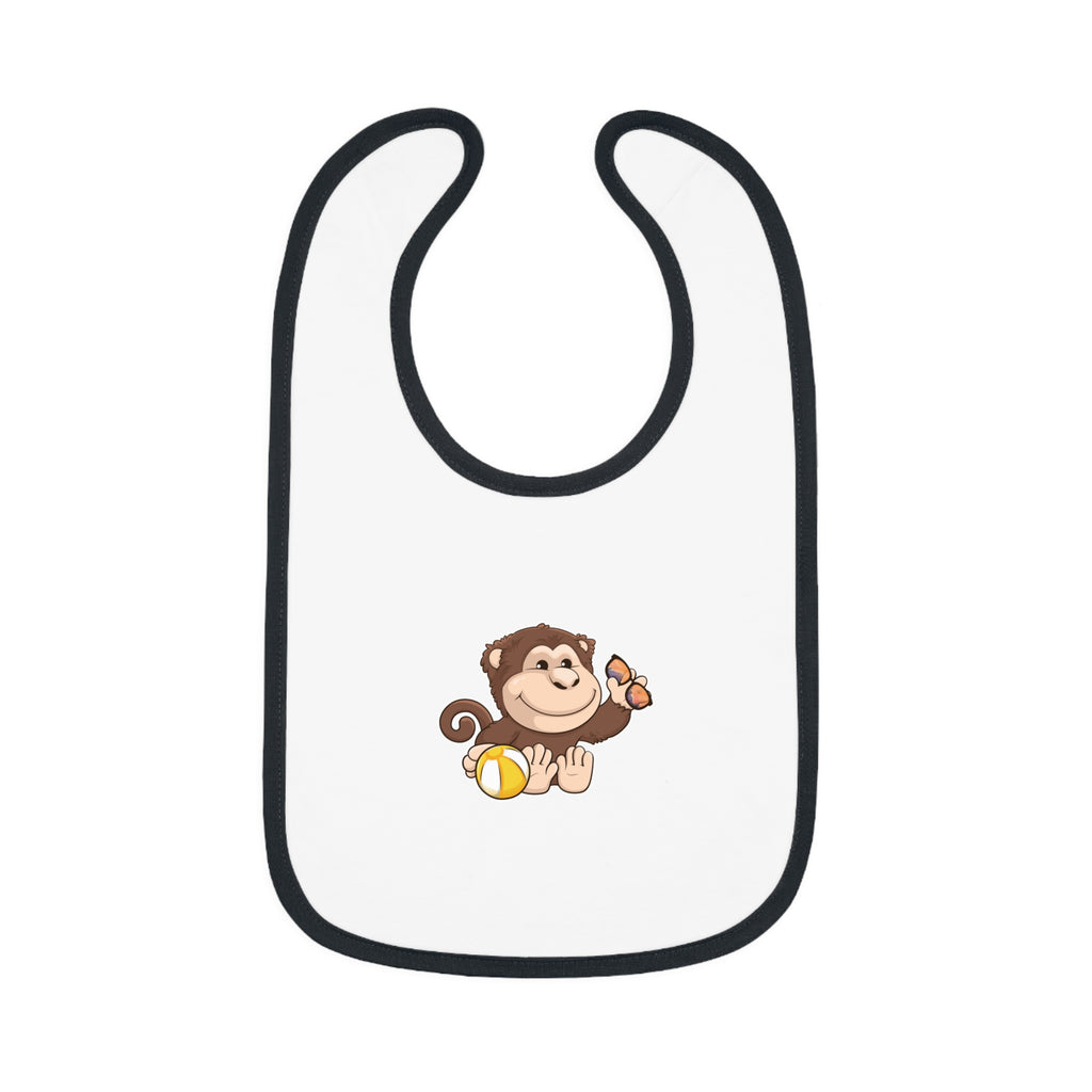 A white baby bib with black trim and a small picture of a monkey.