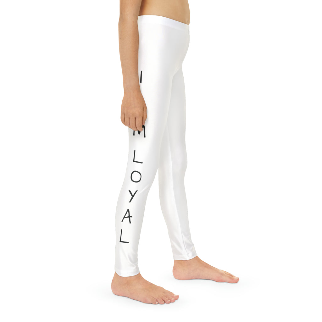 Right side-view of a child wearing white leggings with a picture of a dog on the front left waist and the phrase "I am loyal" read top to bottom on the side of each leg.
