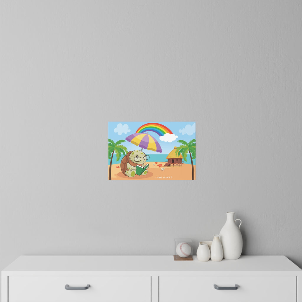 An 18 by 12 inch wall decal on a grey wall above a dresser. The wall decal has a scene of a turtle reading a book under an umbrella on the beach, a rainbow in the background, and the phrase "I am smart" along the bottom.