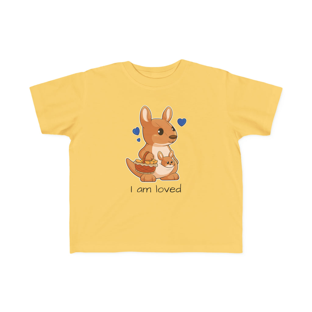 A short-sleeve yellow shirt with a picture of a kangaroo that says I am loved.