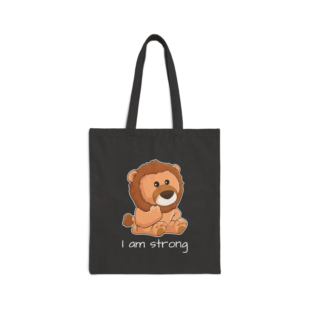A black tote bag with a picture of a lion that says I am strong.