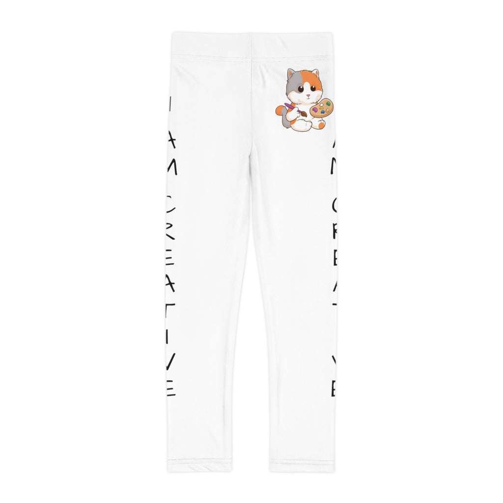 White leggings with a picture of a cat on the front left waist and the phrase "I am creative" read top to bottom on the side of each leg.