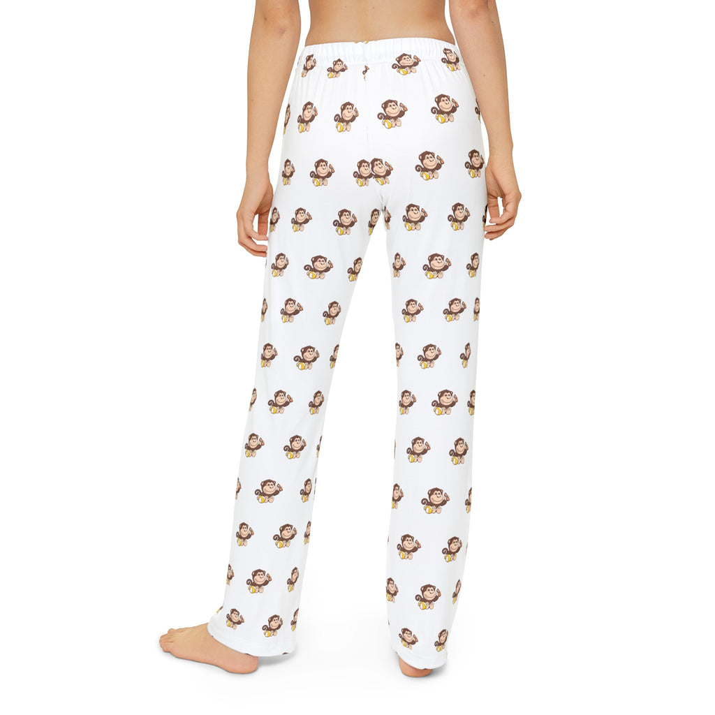 Back-view of a kid wearing white pajama pants with a repeated pattern of a monkey.
