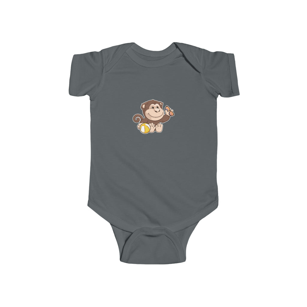 A charcoal grey baby onesie with a picture of a monkey.