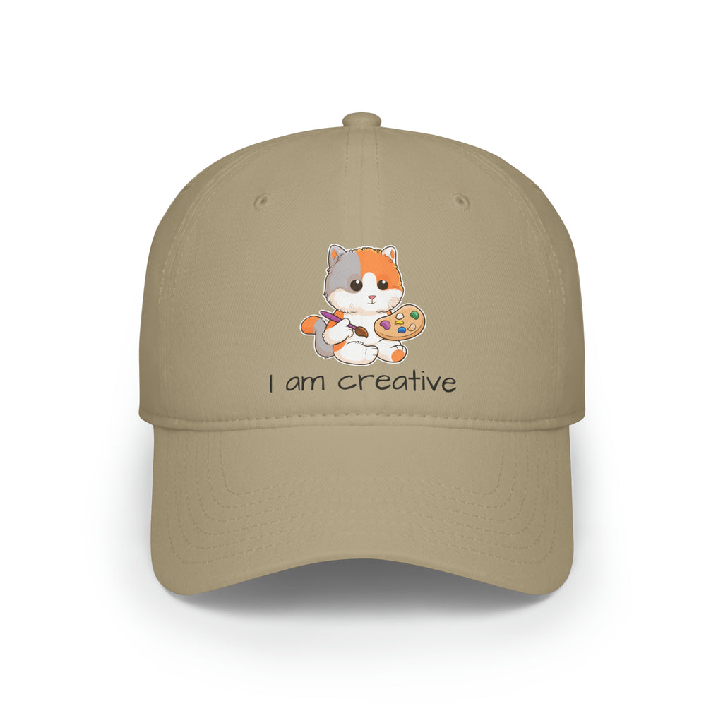 Front-view of a khaki baseball hat with a picture of a cat that says I am creative.