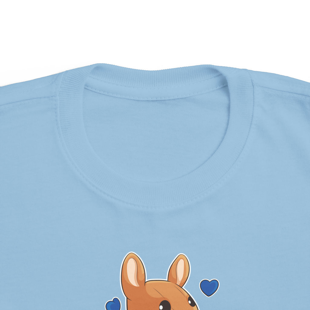 A close-up of the crew neckline of a short-sleeve light blue shirt with a picture of a kangaroo that says I am loved.
