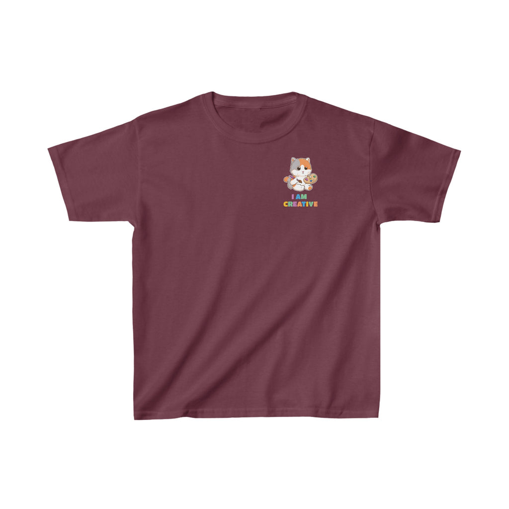 A short-sleeve maroon shirt with a small picture on the left chest. The image is a cat with a multi-color phrase below it that says I am creative.