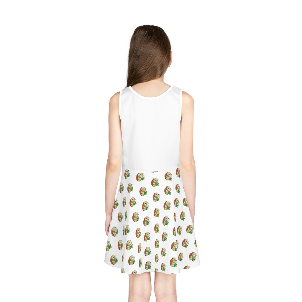 Back-view of a girl wearing a sleeveless white dress with a white top and a repeating pattern of a turtle on the skirt.