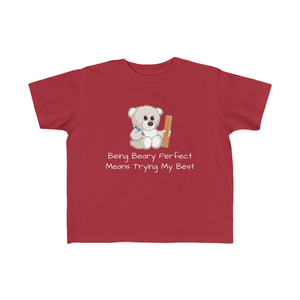 A short-sleeve garnet red shirt with a picture of a bear that says "Being beary perfect means trying my best".