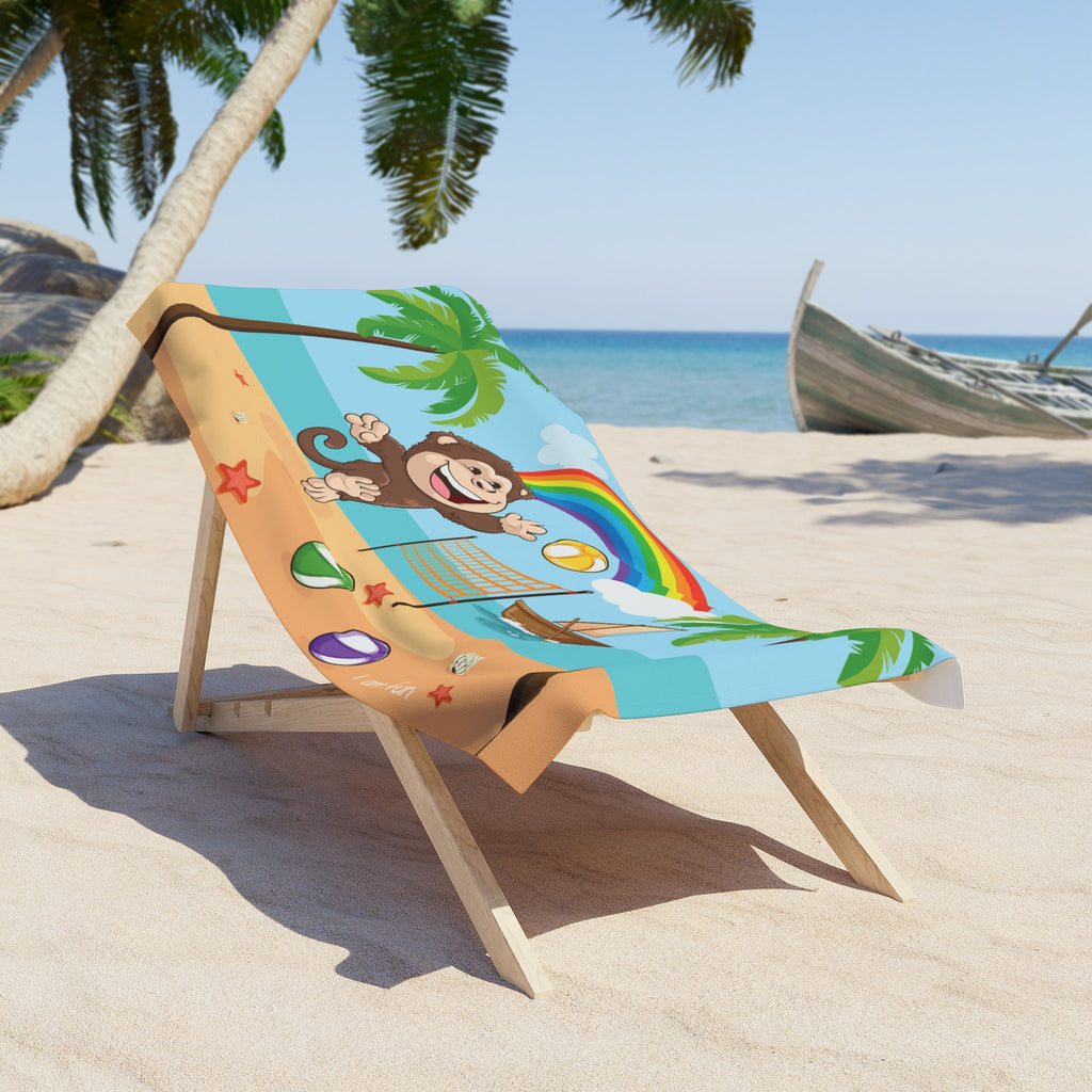 A 30 by 60 inch beach towel draped over a chair on a beach. The towel has a scene of a monkey playing volleyball on the beach, a rainbow in the background, and the phrase "I am fun" along the bottom.