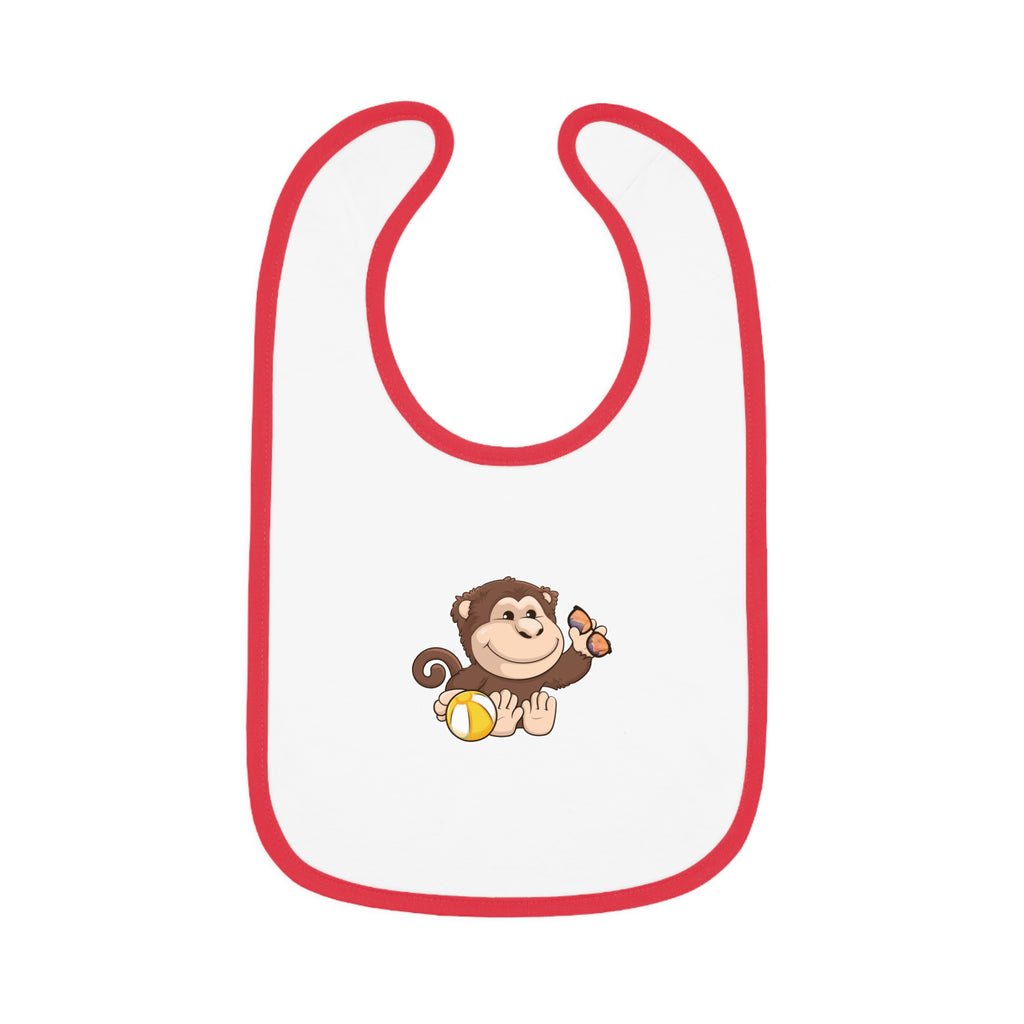 A white baby bib with red trim and a small picture of a monkey.