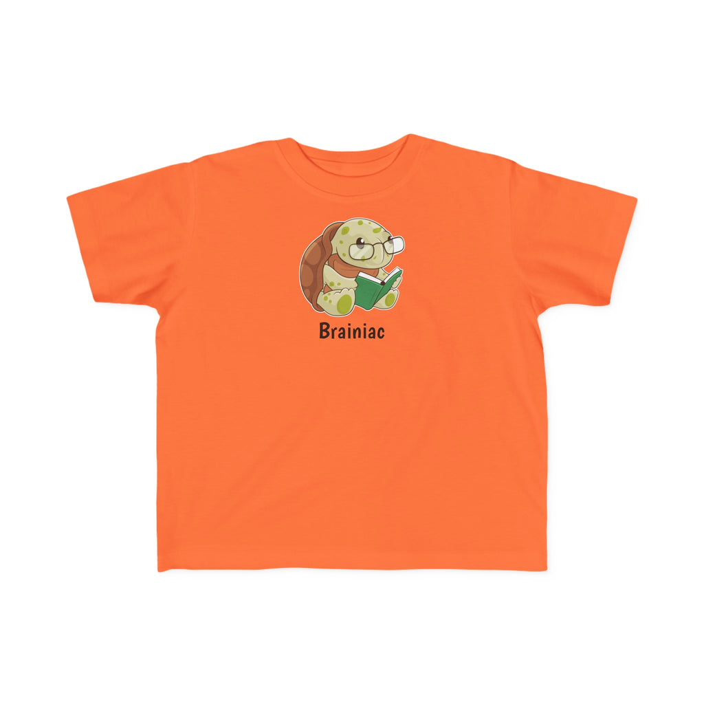 A short-sleeve orange shirt with a picture of a turtle that says Brainiac.